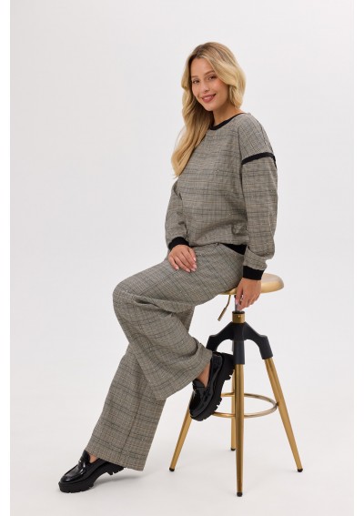 Spodnie w kratkę z cekinami...